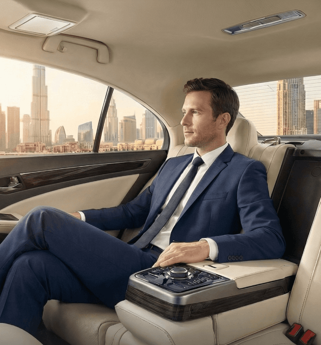 Executive passenger working in the rear seat